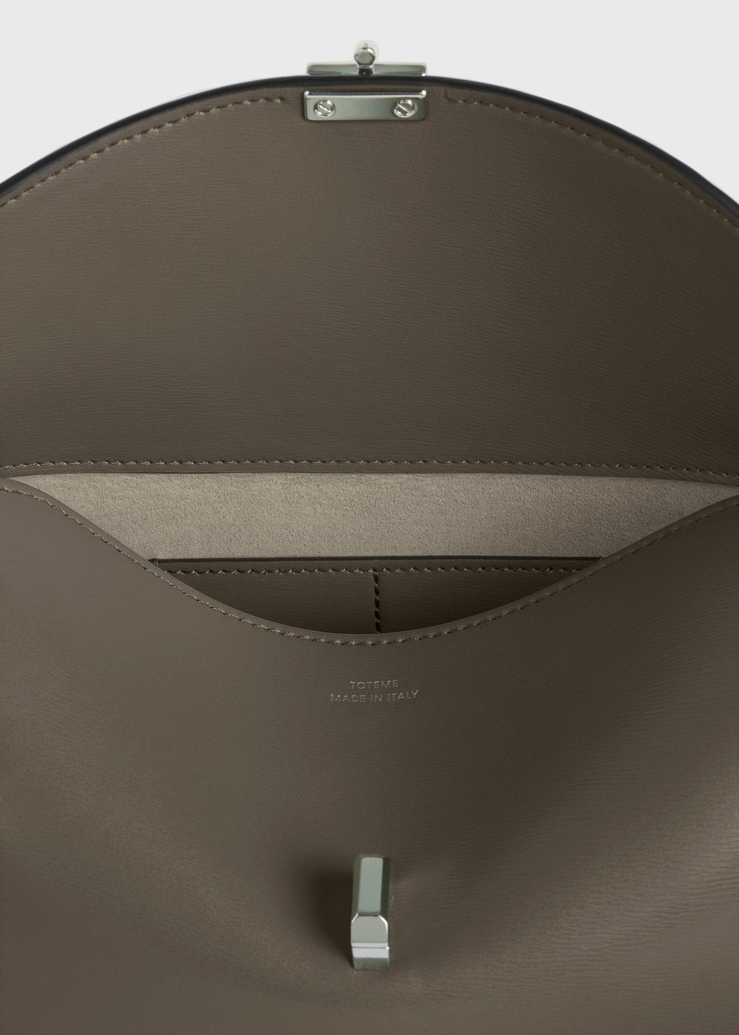 Totême T-Lock Leather Clutch in Taupe