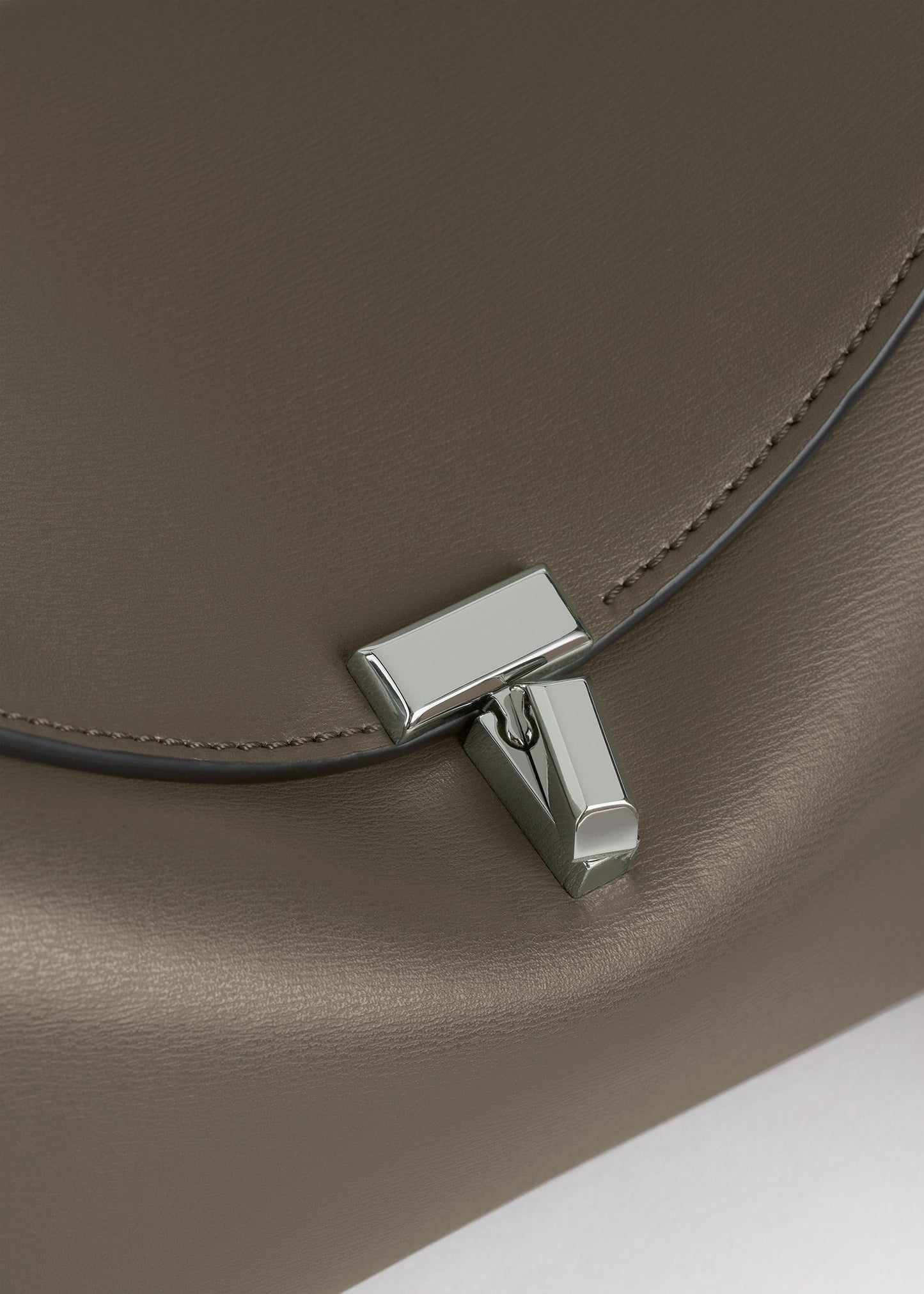 Totême T-Lock Leather Top-Handle Bag in Taupe