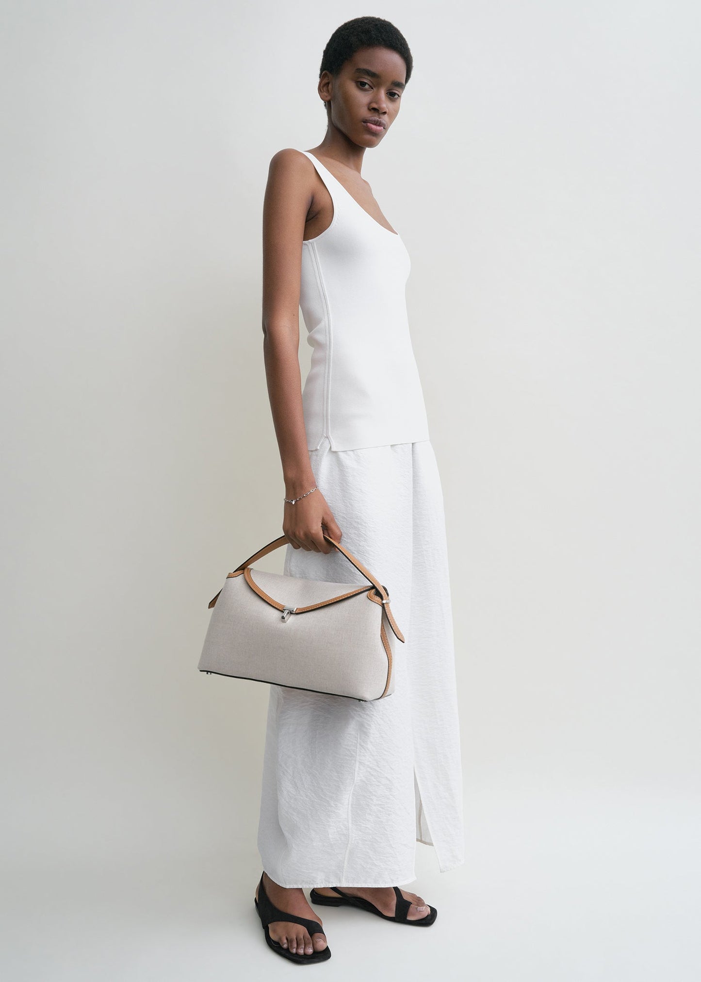 Totême T-Lock Canvas Top Handle in ecru/Tan.