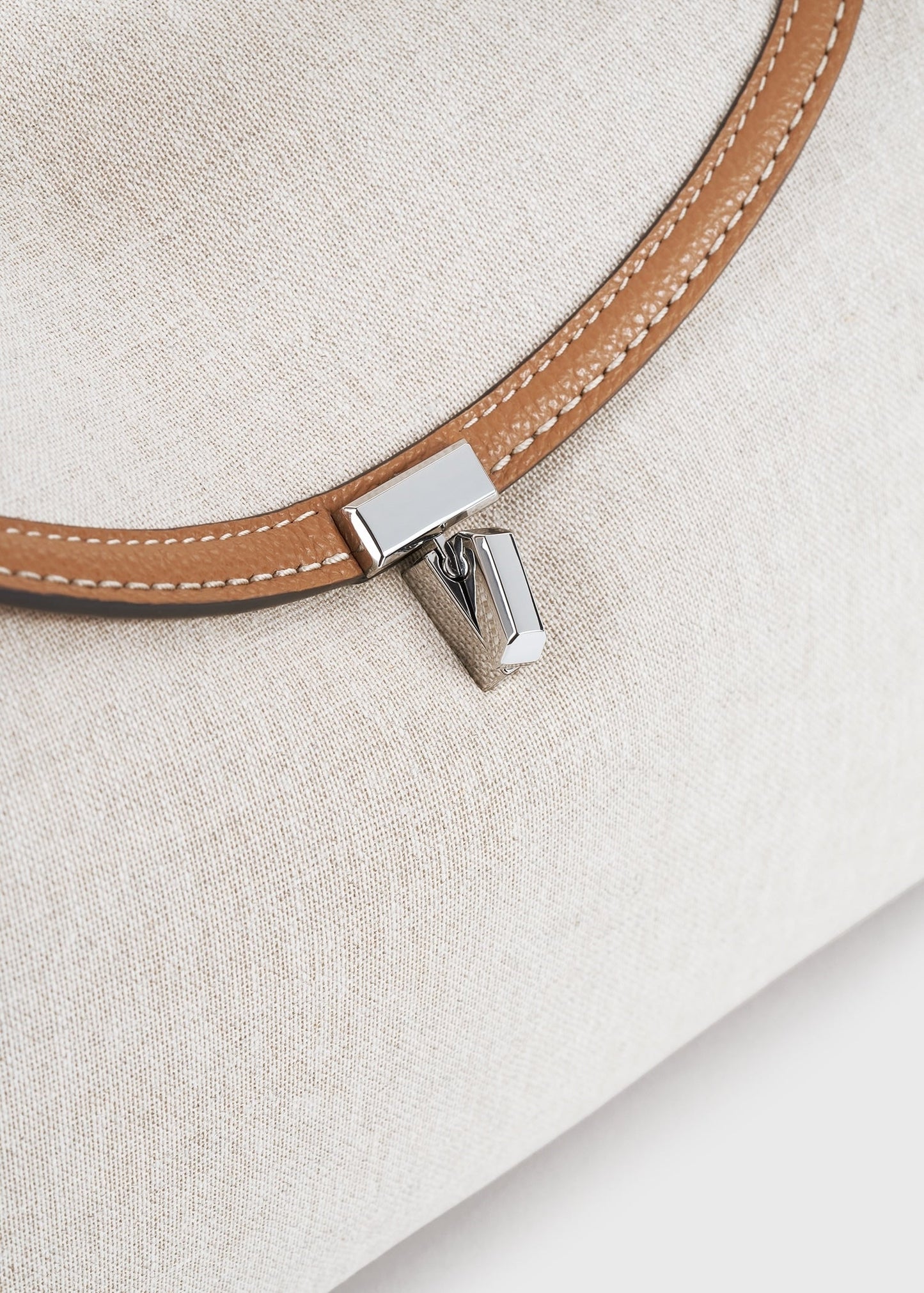 Totême T-Lock Canvas Top Handle in ecru/Tan.