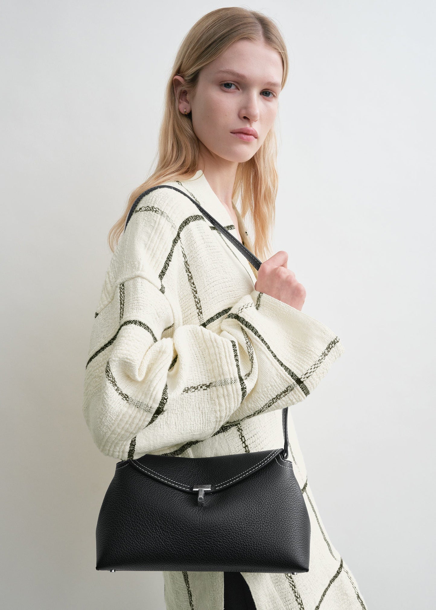 Totême T-Lock Leather Clutch Handbag with Crossbody strap