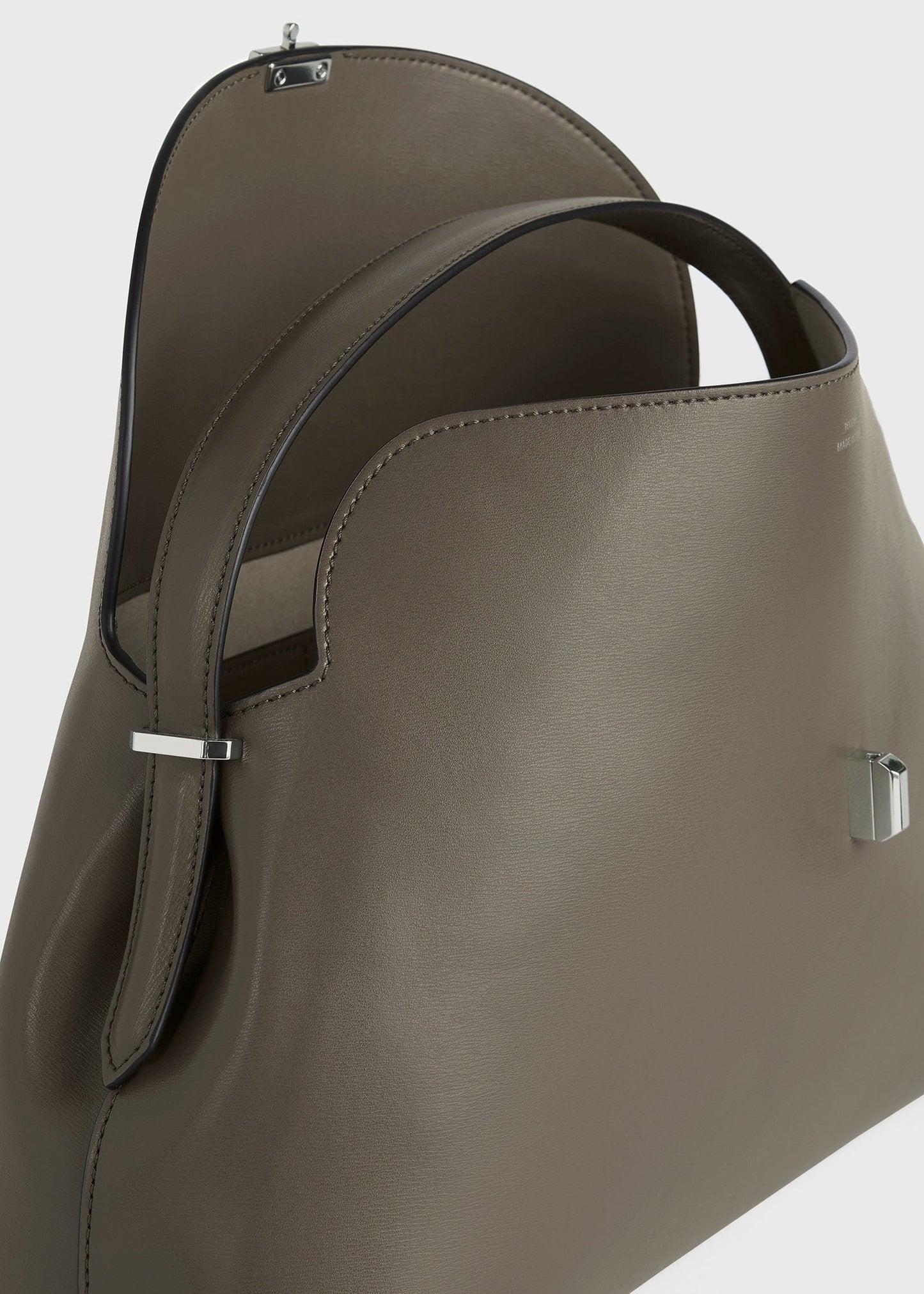 Totême T-Lock Leather Clutch in Taupe