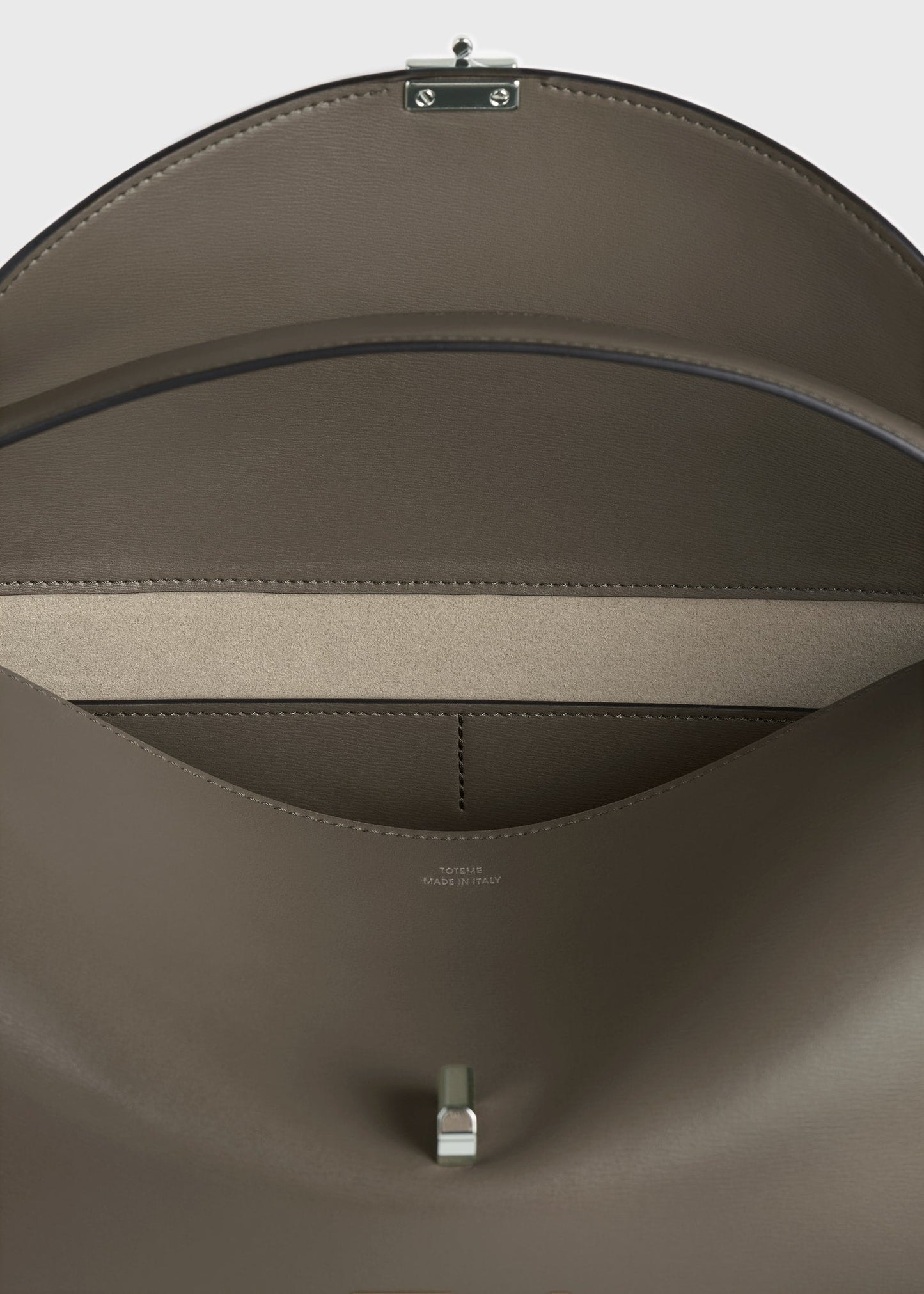 Totême T-Lock Leather Clutch in Taupe