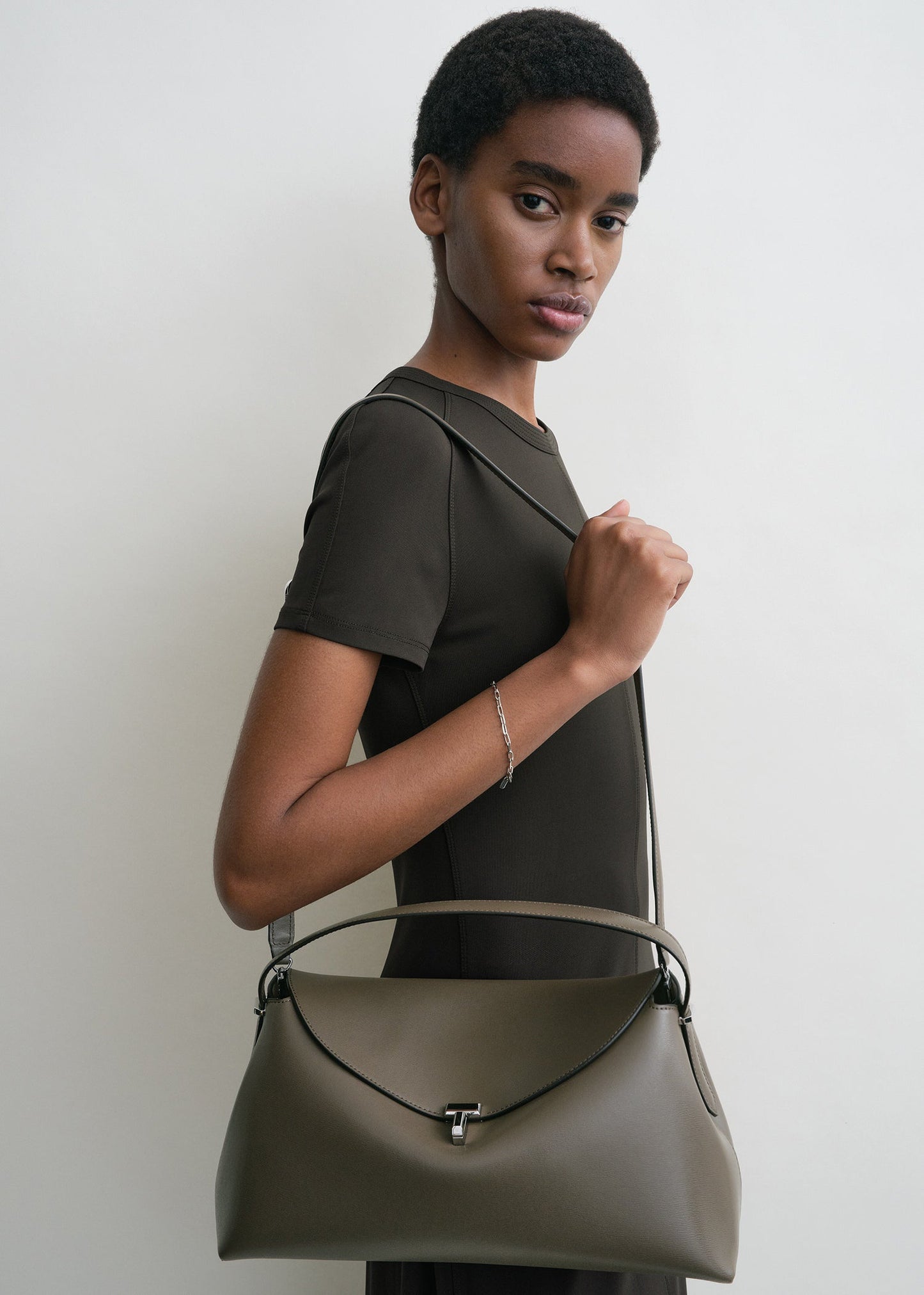 Totême T-Lock Leather Top-Handle Bag in Taupe