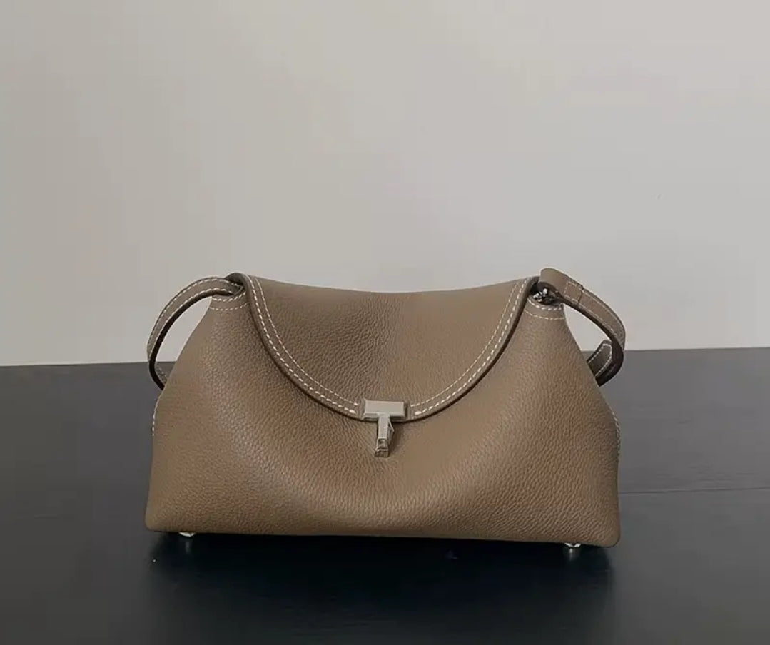 Totême T-Lock Leather Clutch in Taupe